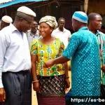 베냉의 화폐와 환전 방법 - **Vibrant Local Market Scene in Cotonou, Benin**
"A bustling, open-air market in Cotonou, Benin,...